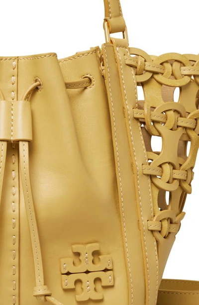 Shop Tory Burch Mcgraw Drawstring Leather Satchel In Beeswax