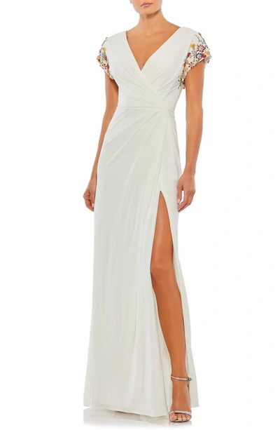 Shop Mac Duggal Jeweled Sleeve Faux Wrap Gown In White Multi