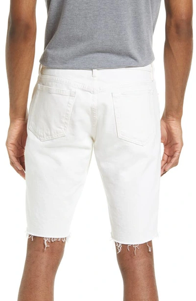 Shop Frame L'homme Cutoff Denim Shorts In Off White