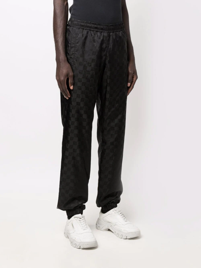 Misbhv Logo-monogram Tapered Joggers In Schwarz