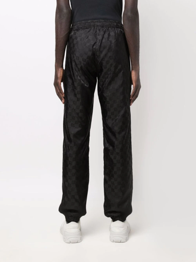 Misbhv Logo-monogram Tapered Joggers In Schwarz