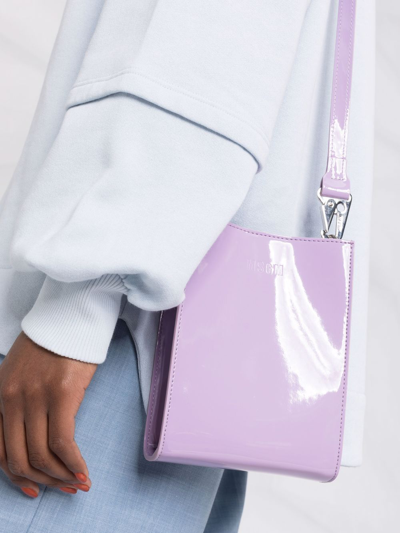 Shop Msgm Embossed Logo Pouch Bag In Purple