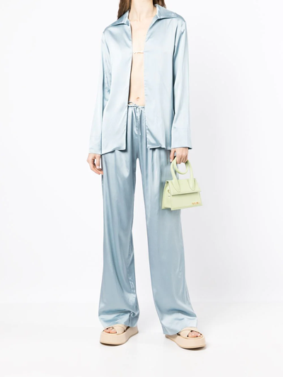 Shop Jacquemus Wide-leg Satin Trousers In Blue