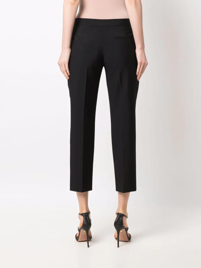Shop Alexander Mcqueen Low-rise Cropped Trousers In Black