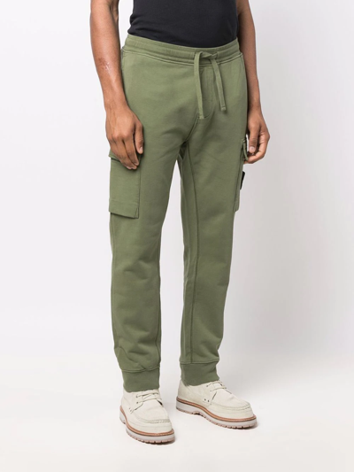 Shop Stone Island Compass Badge Track Pants In Green