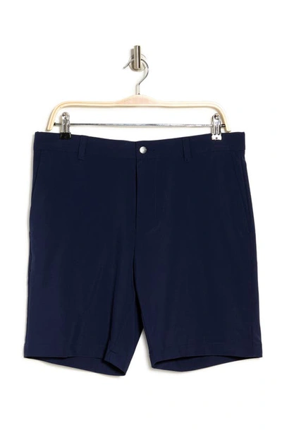 Shop Callaway Golf ®  9" Flat Front Shorts In Peacoat