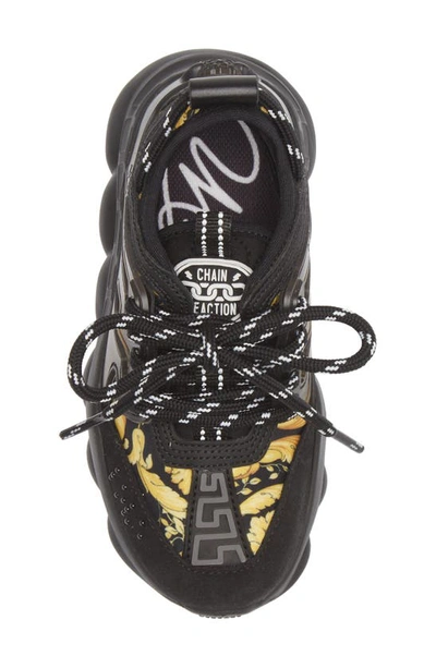 Shop Versace Chain Reaction Sneaker In Black Gold