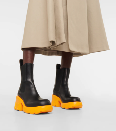 Shop Bottega Veneta Flash Leather Chelsea Boots In Black-tangerine