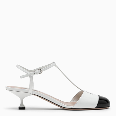 Shop Miu Miu White/black Patent Leather Slingback Pumps