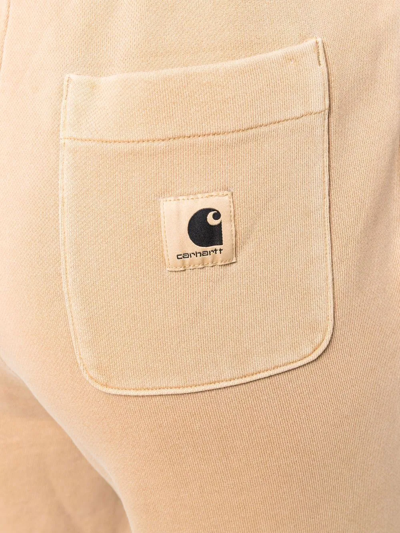Shop Carhartt Nelson Logo-patch Track Pants In Brown