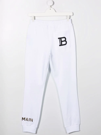 Shop Balmain Logo-print Track Pants In White