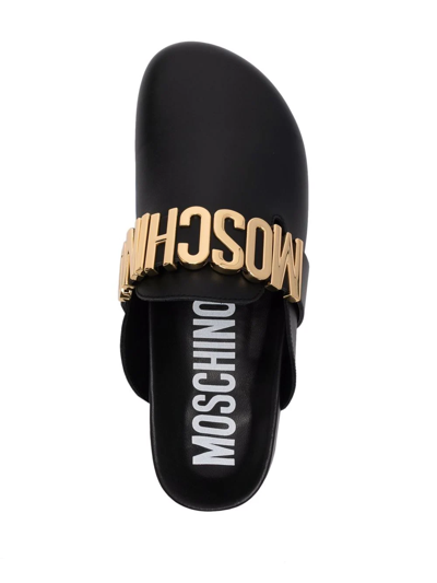Shop Moschino Logo-plaque Slippers In Black