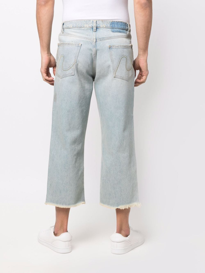 Shop Erl Distressed Cropped Jeans In Blau