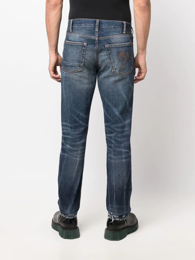 Shop Palm Angels Slim-fit Distressed Straight-leg Jeans In Blue