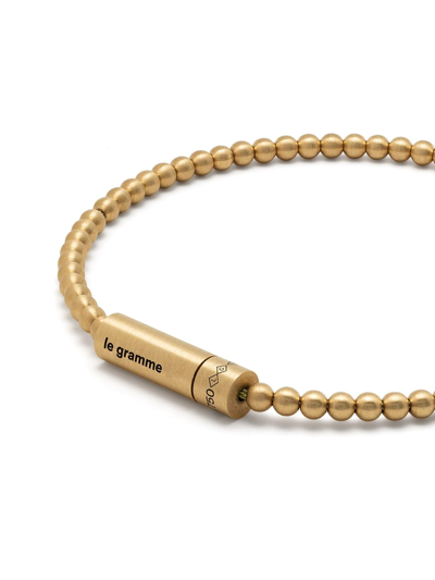 Shop Le Gramme 15g Brushed Yellow Gold Beaded Bracelet