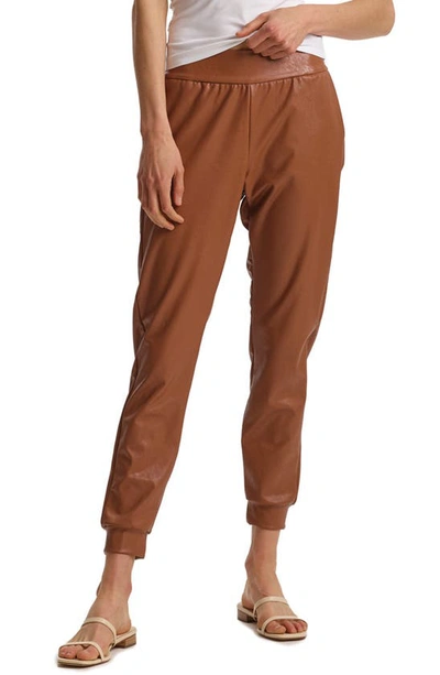 Shop Commando Faux Leather Jogger Pants In Cocoa