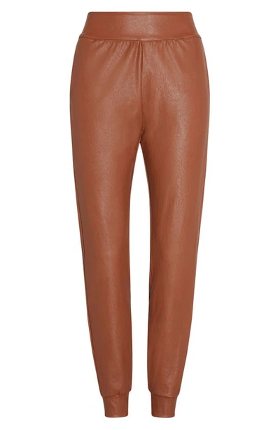 Shop Commando Faux Leather Jogger Pants In Cocoa