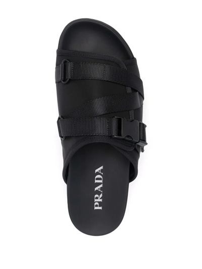 Shop Prada Tape Buckled Slide Sandals In Schwarz