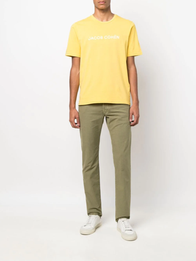 Shop Jacob Cohen Logo-patch Slim Trousers In Grün