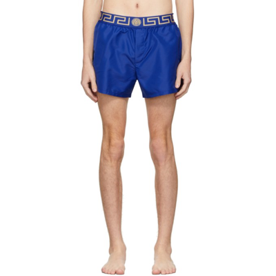 Shop Versace Blue Greca Border Swim Shorts In A85k Blue