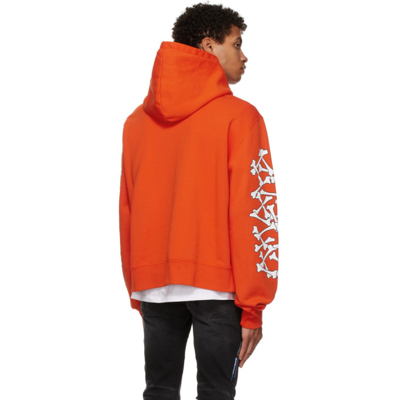 Amiri Bones Printed Logo Hoodie In Orange White | ModeSens