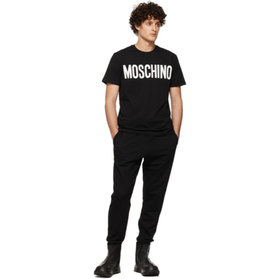 Shop Moschino Black Logo Print T-shirt In A1555 Fantasy Print
