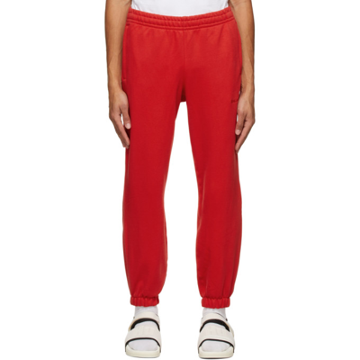 Shop Adidas X Humanrace By Pharrell Williams Red Humanrace Basics Lounge Pants In Vivid Red
