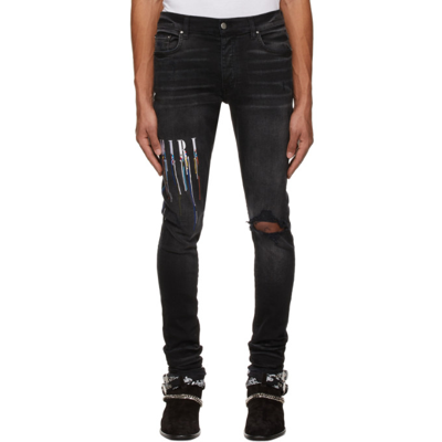 Shop Amiri Black Paint Drop Logo Jeans In Aged Black