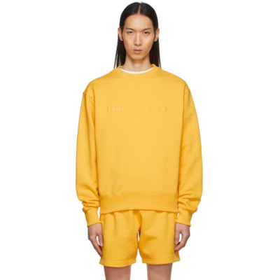 Shop Adidas X Humanrace By Pharrell Williams Ssense Exclusive Yellow Humanrace Tonal Logo Sweatshirt In Bold Gold 005a