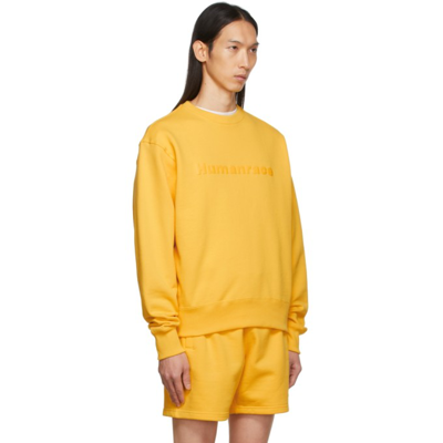 Shop Adidas X Humanrace By Pharrell Williams Ssense Exclusive Yellow Humanrace Tonal Logo Sweatshirt In Bold Gold 005a
