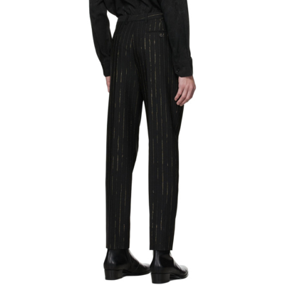 Shop Saint Laurent Black Wool Pinstripe Trousers In 1055 Black/gold