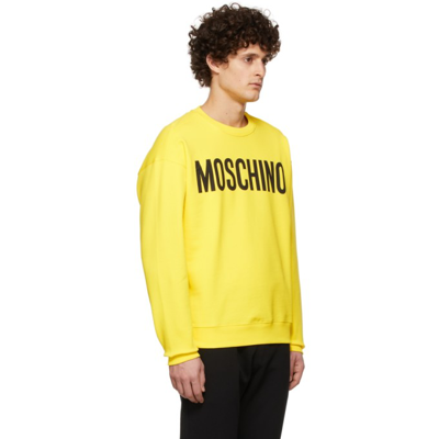 Shop Moschino Yellow Logo Print Sweatshirt In A1033 Fantasy Print