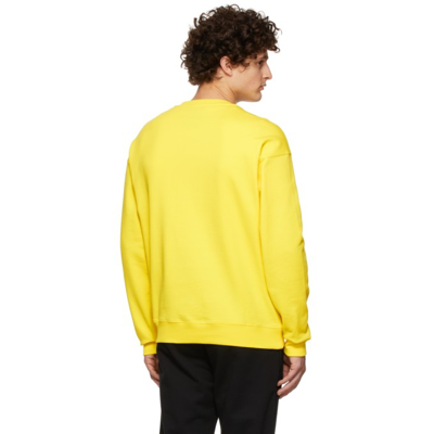 Shop Moschino Yellow Logo Print Sweatshirt In A1033 Fantasy Print