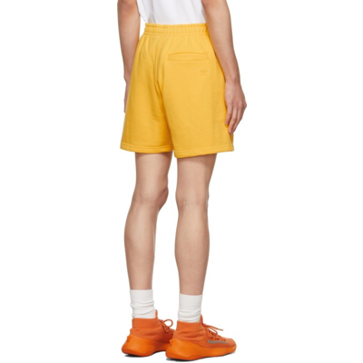 Shop Adidas X Humanrace By Pharrell Williams Ssense Exclusive Yellow Humanrace Basics Shorts In Bold Gold 005a