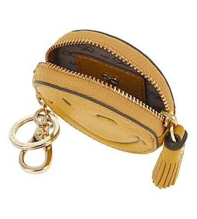 Shop Anya Hindmarch Wink Face Leather Coin Purse In Mustard