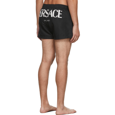 Shop Versace Black Logo Swim Shorts In 1b000 Black