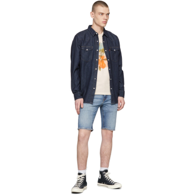 Shop Levi's Blue Distressed 412 Slim Shorts In Mind Pop Adv Short
