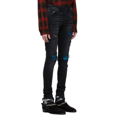 Amiri Mx1 Cracked Paint Skinny Jeans In Aged Black