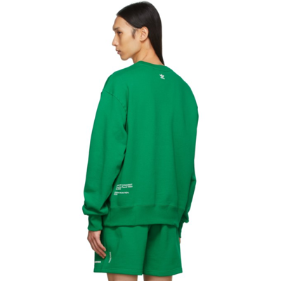 Shop Adidas X Humanrace By Pharrell Williams Ssense Exclusive Green Humanrace Logo Sweatshirt In Green 020a