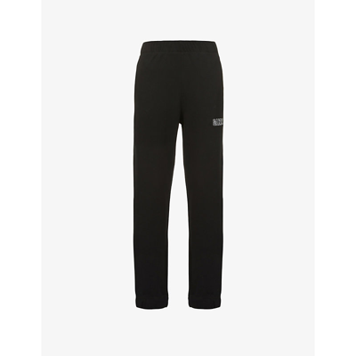 Shop Ganni Isoli Tapered High-rise Organic Cotton-blend Jogging Bottoms In Black
