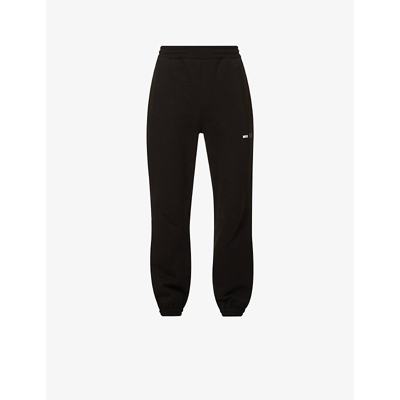 Shop Mcq By Alexander Mcqueen Logo-embroidered Relaxed-fit Wide-leg Cotton-jersey Jogging Bottoms In Darkest Black