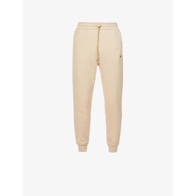 Shop Vivienne Westwood Classic Relaxed-fit Tapered Cotton-jersey Jogging Bottoms In Beige