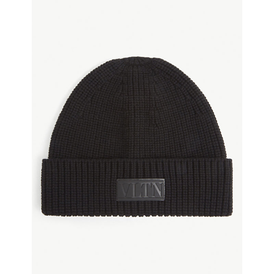 Shop Valentino Logo-patch Chunky-knit Wool Beanie Hat In Nero/avorio