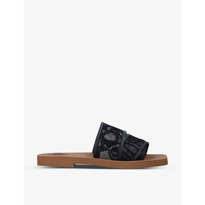 Shop Chloé Woody Logo-woven Lace Mules In Black