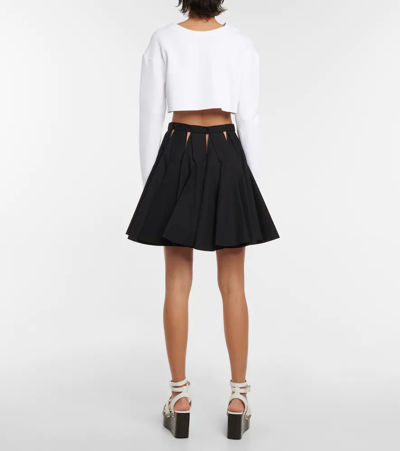 Shop Alaïa Pleated Miniskirt In Noir