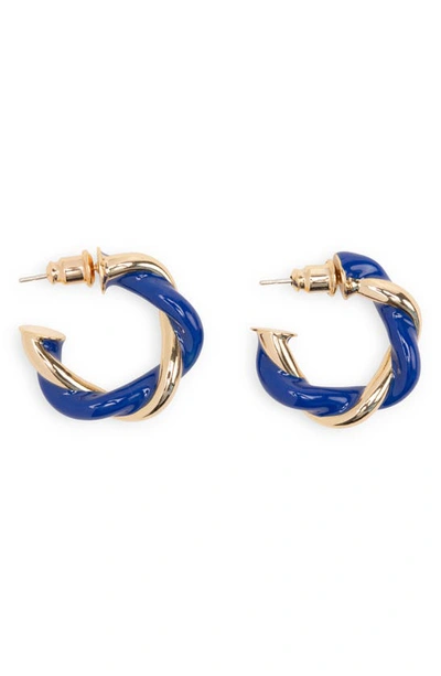 Shop Petit Moments Carmel Twist Hoop Earrings In Gold/ Navy