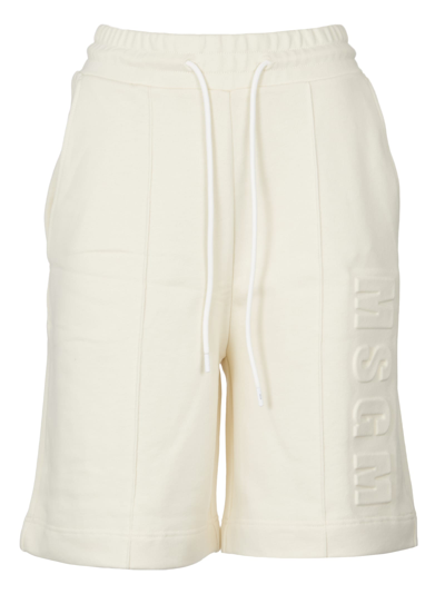 Msgm Logo Embossed Track Shorts In Off White