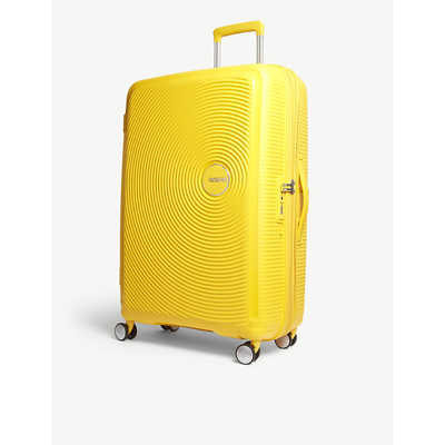 Shop American Tourister Golden Yellow Soundbox Expandable Four-wheel Suitcase 77cm