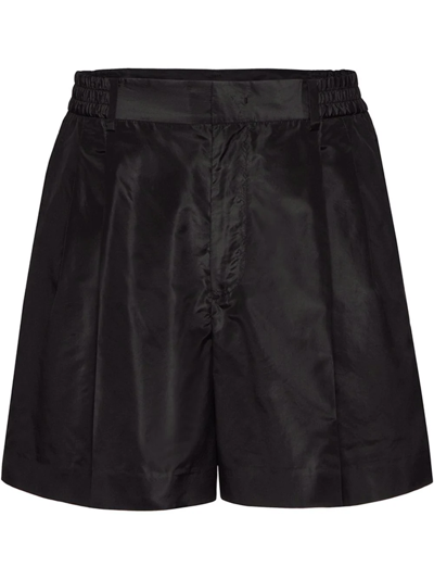 Shop Valentino Pressed-crease Tailored Shorts In Black