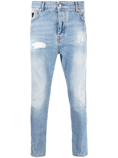 Shop John Richmond Slim-cut Distressed Jeans In Blue